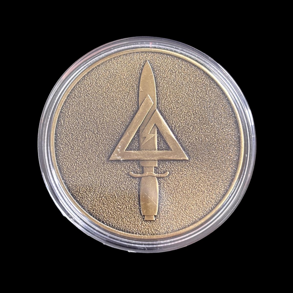 Moneta sfida "ATTENZIONE AI MIGLIORI OPPRESSORI D'AMERICA"