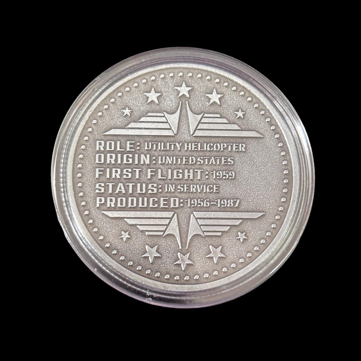 ORIGEN DEL ROL PRIMER VUELO UH-1 HUEY Moneda de desafío