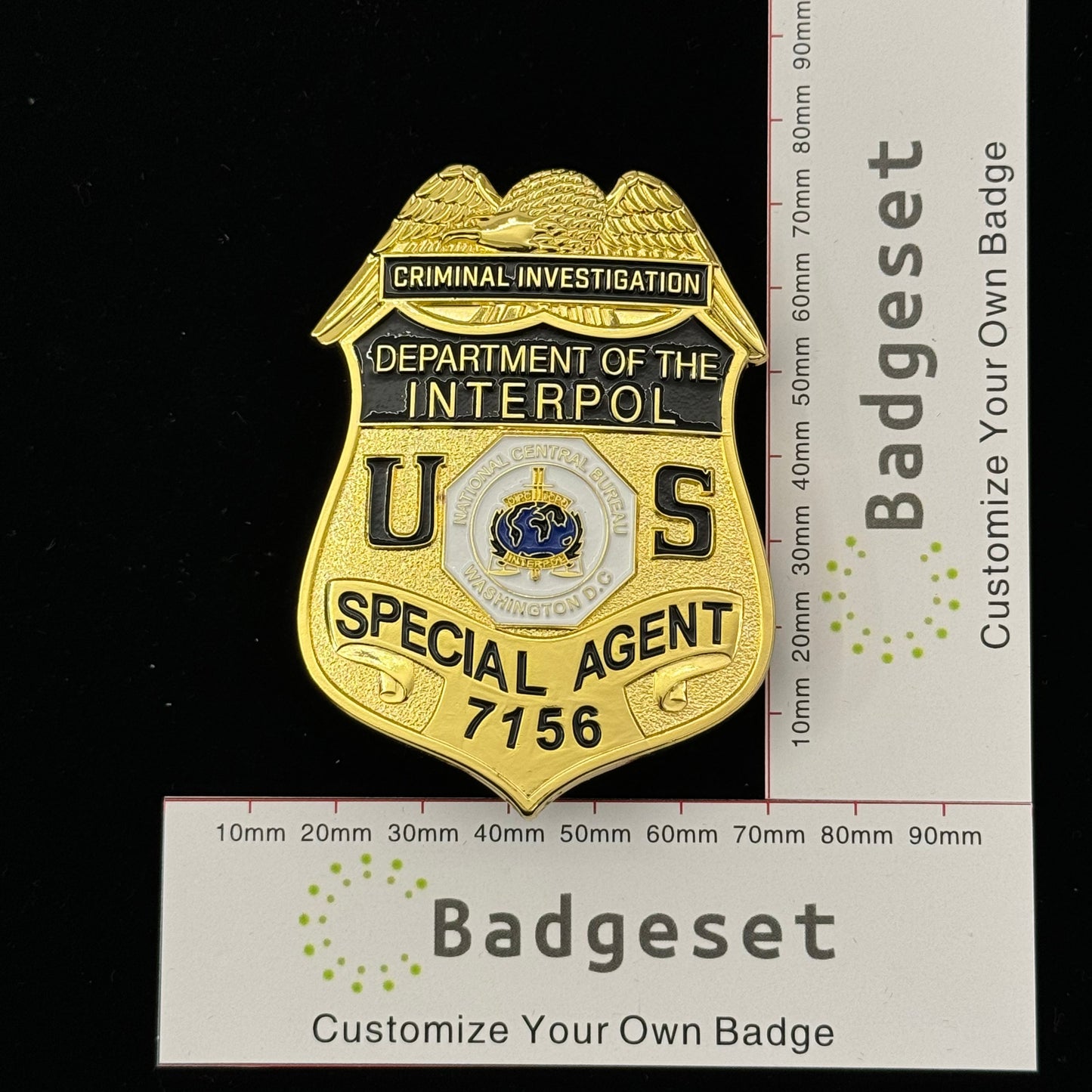Replica del distintivo dell'agente speciale dell'Interpol, dipartimento di investigazione criminale, oggetti di scena del film n. 7156