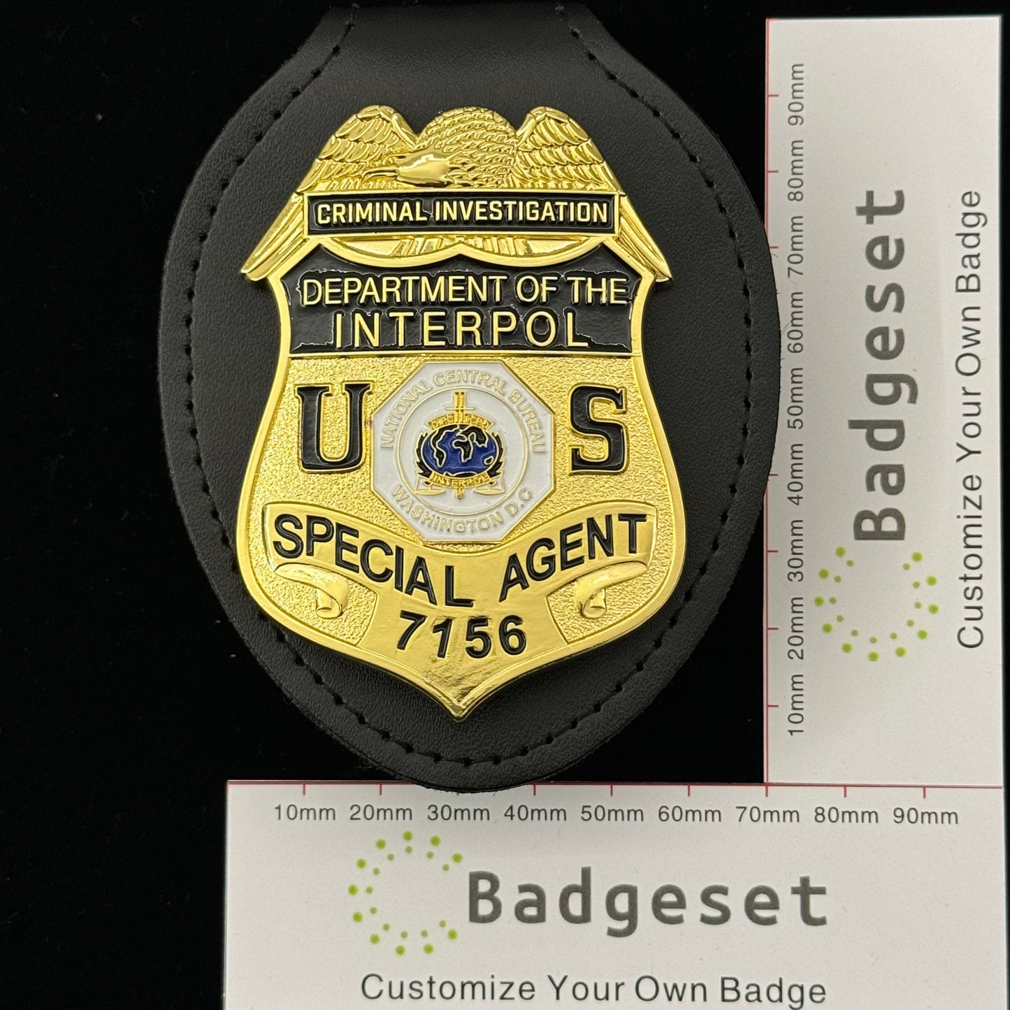 Replica del distintivo dell'agente speciale dell'Interpol, dipartimento di investigazione criminale, oggetti di scena del film n. 7156