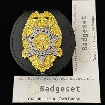 Replica del distintivo da supervisore dell'agente speciale del Dipartimento di Giustizia della California degli Stati Uniti, oggetto di scena del film